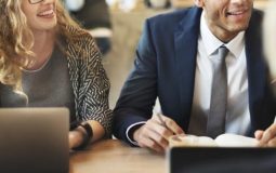 Image of team meeting, discussing how to Create, Grow and Protect the Brands of a client